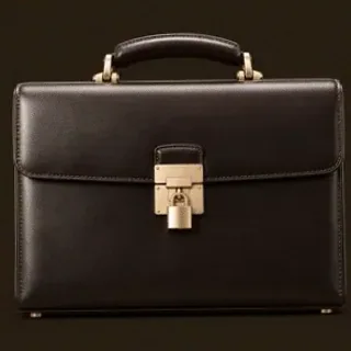 Locked leather briefcase — Kingmaker Casino